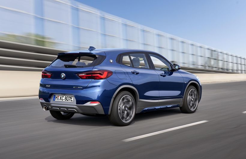 Blue BMW xdrive25e rear and right side